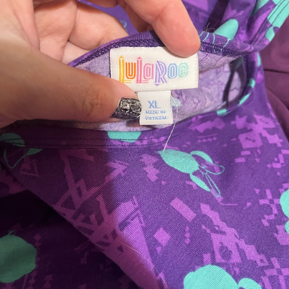 LuLaRoe Purple and Teal Graphic Disney top